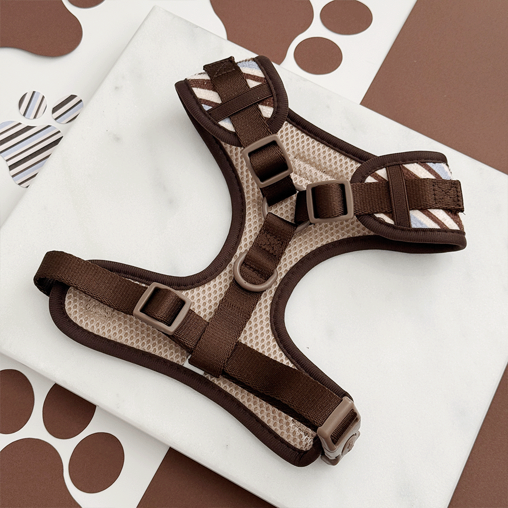Brown, blue and white striped Dog Harness, showing the reverse side with D Ring and adjustable straps.