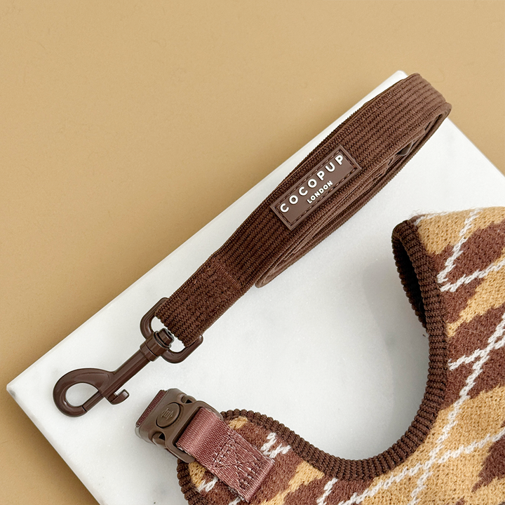 Brown ribbed dog lead with Cocopup logo badge.